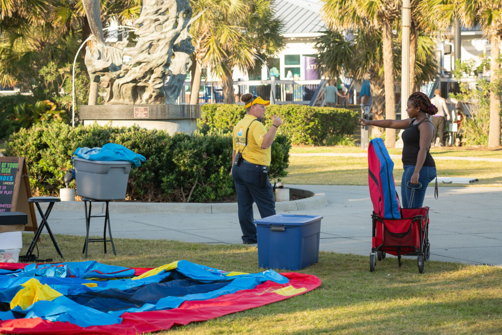 Gold Cap Ambassador Helping with Festival Set up