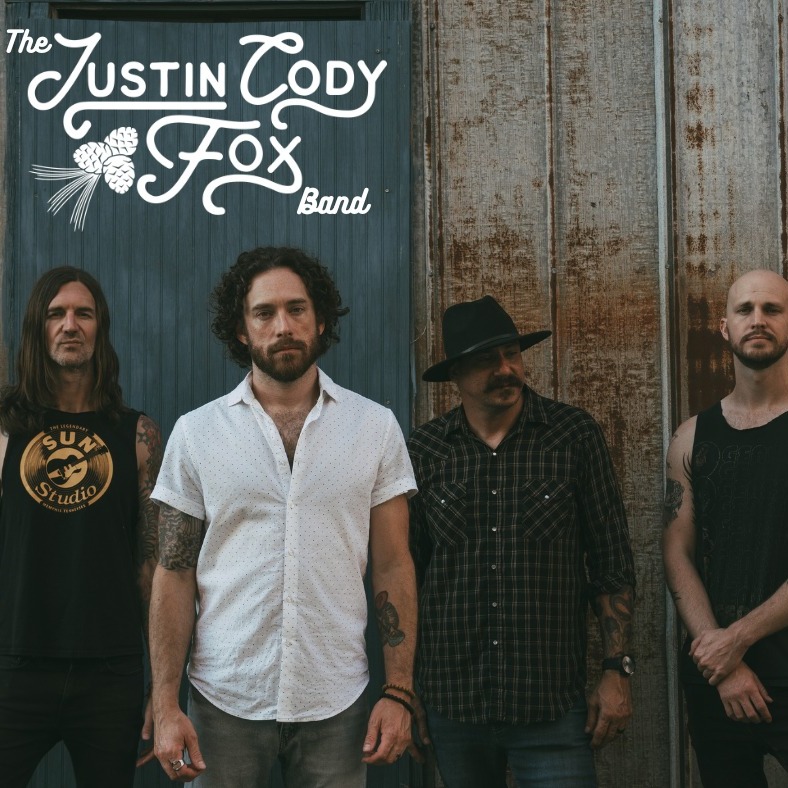 Justin Fox Band — blues and Southern rock guitarist performing live on stage — performing at Hot Summer Nights free concerts Myrtle Beach